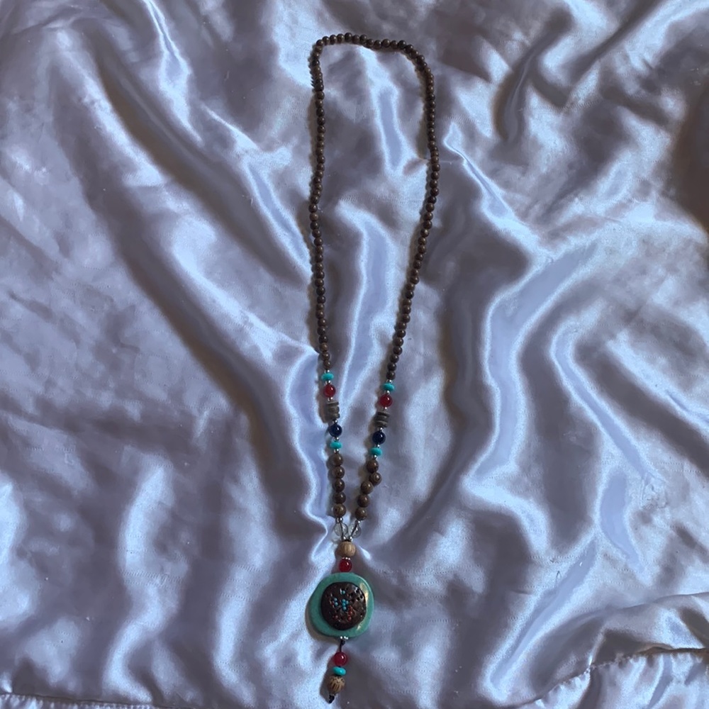 Vintage tong beaded elephant necklace